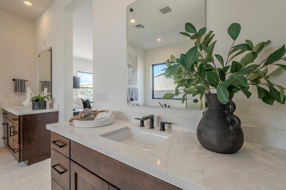 Primary bathroom with dual vanities