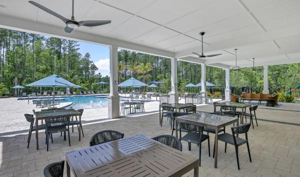 Enjoy socializing with neighbors on the poolside deck