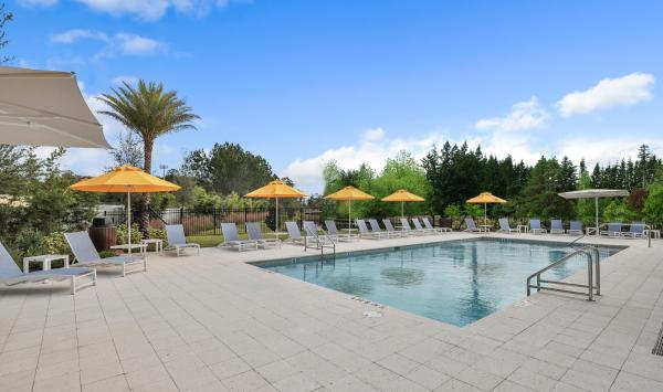 Relax poolside at Newton's private amenities
