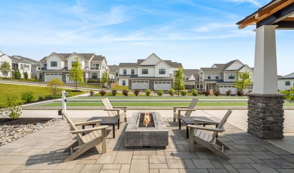 Cozy fire pit overlooks the bocce courts and pavilion