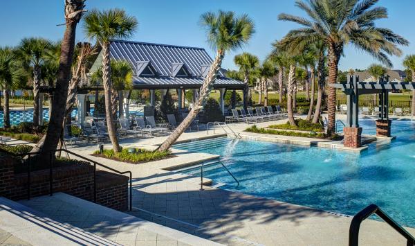 Relax by the RiverHouse pool amidst the Florida sunshine